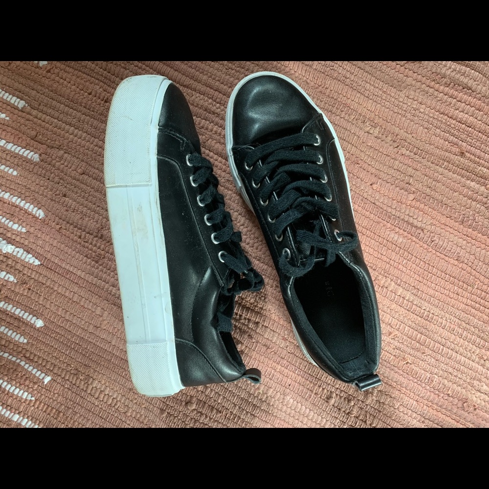 Black platform sneakers